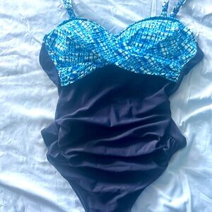 Woman’s blue and white bathing suit